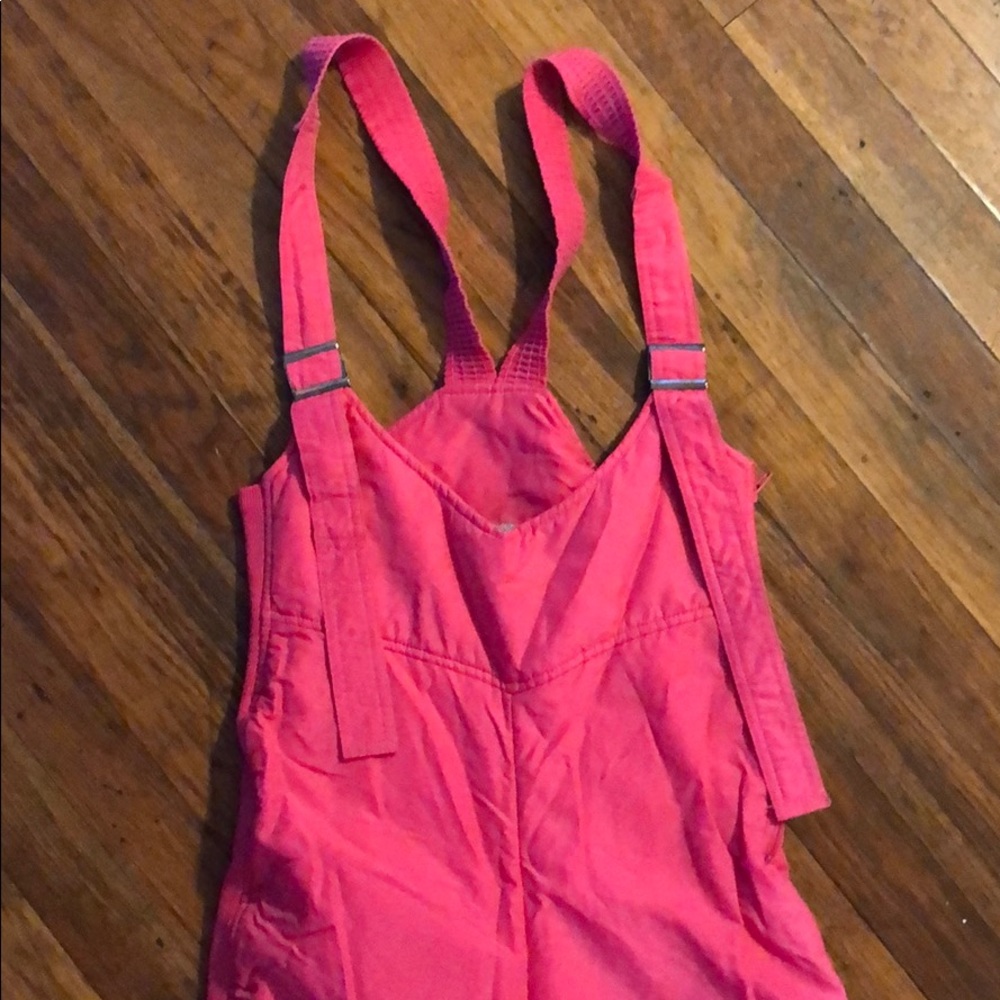 Hot pink ski overalls